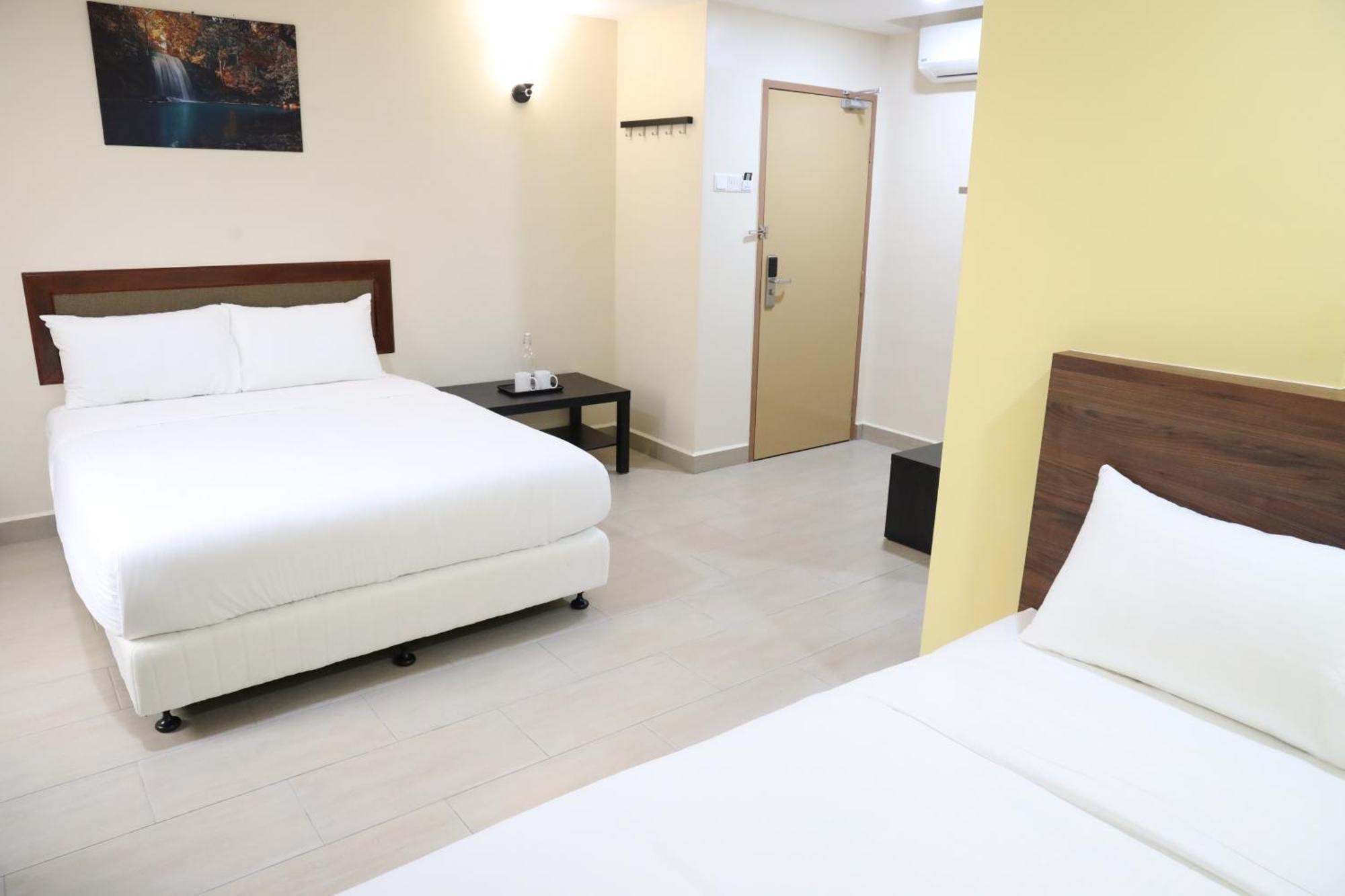 Capital O 90897 Island City Hotel Джордж Таун Екстериор снимка