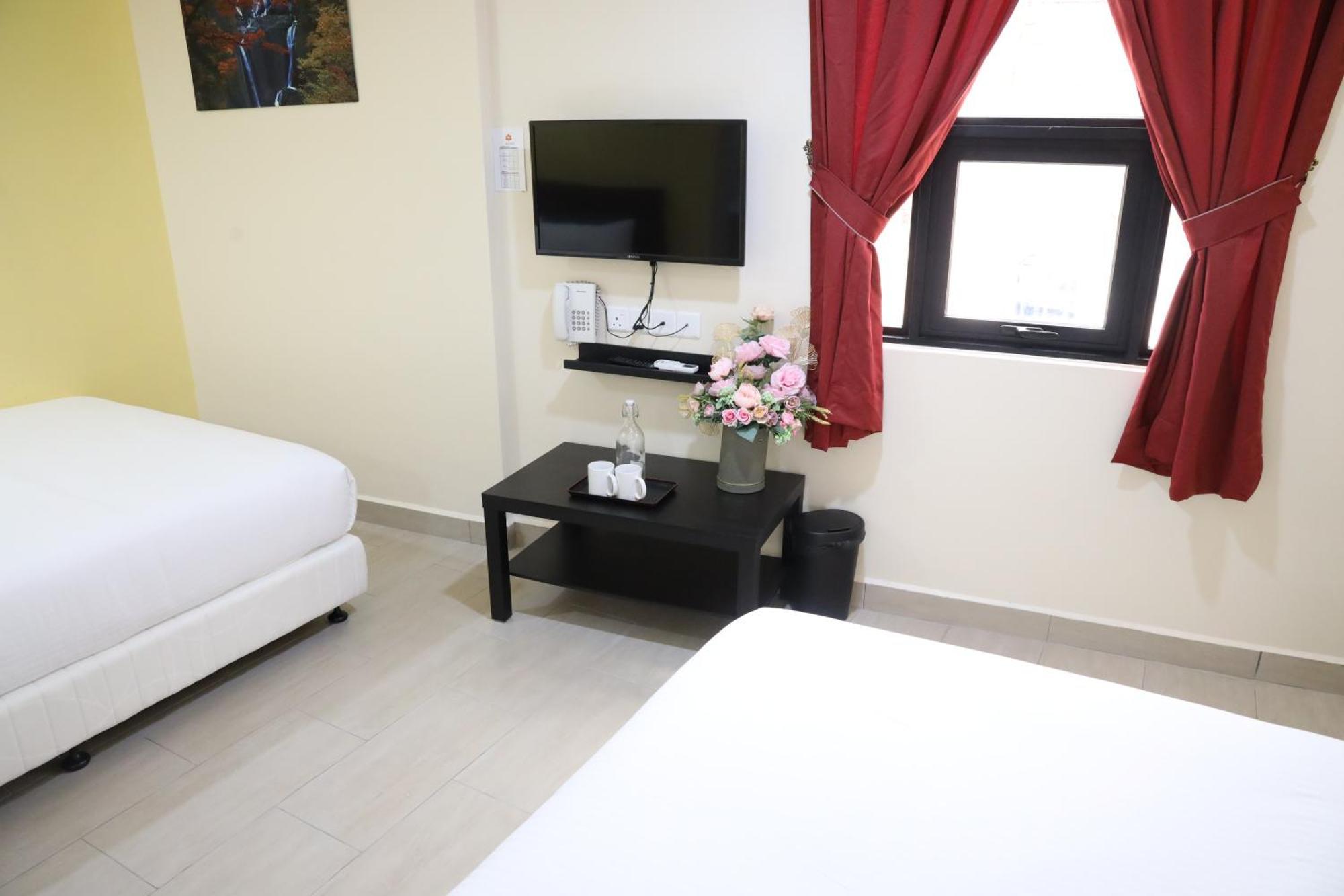 Capital O 90897 Island City Hotel Джордж Таун Екстериор снимка