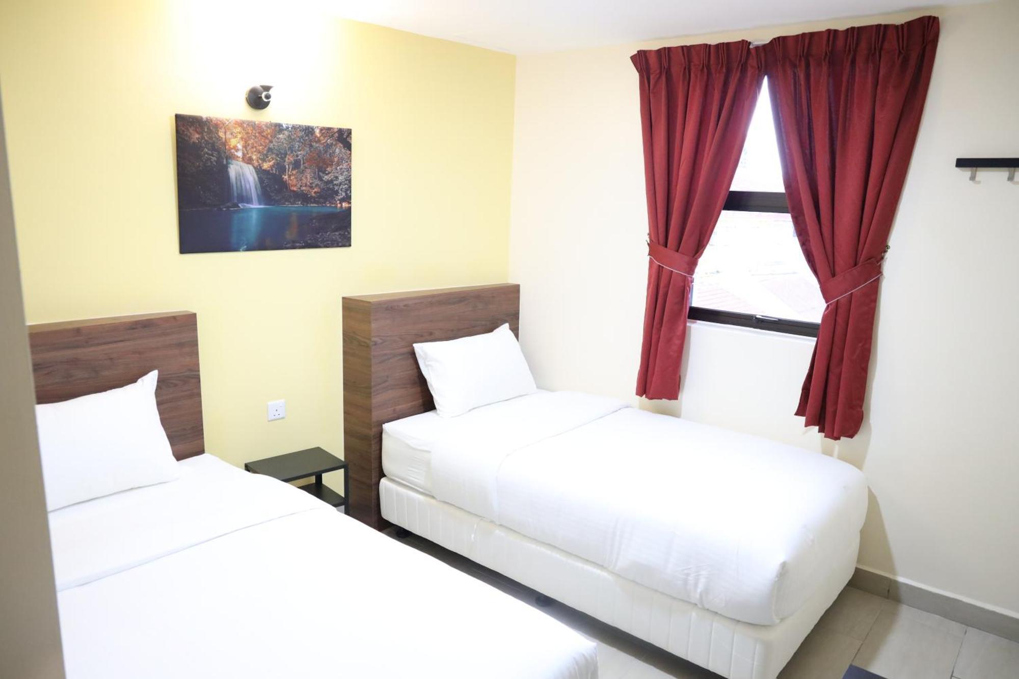 Capital O 90897 Island City Hotel Джордж Таун Екстериор снимка