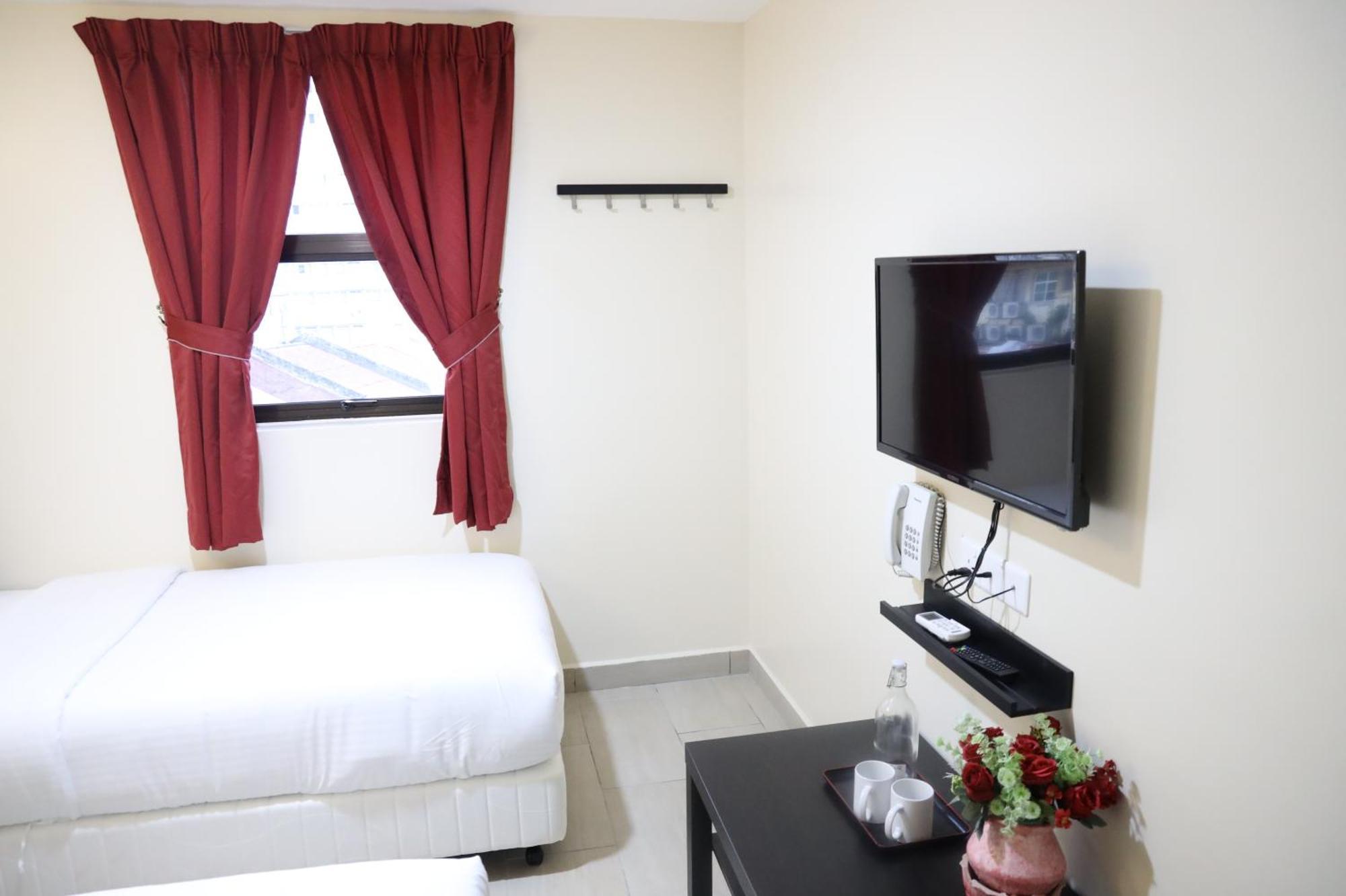 Capital O 90897 Island City Hotel Джордж Таун Екстериор снимка